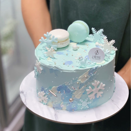 Blue Textured Cake with Macarons and Snowflakes