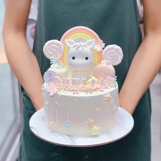 Pastel Candyland with Unicorn and Rainbow Cake
